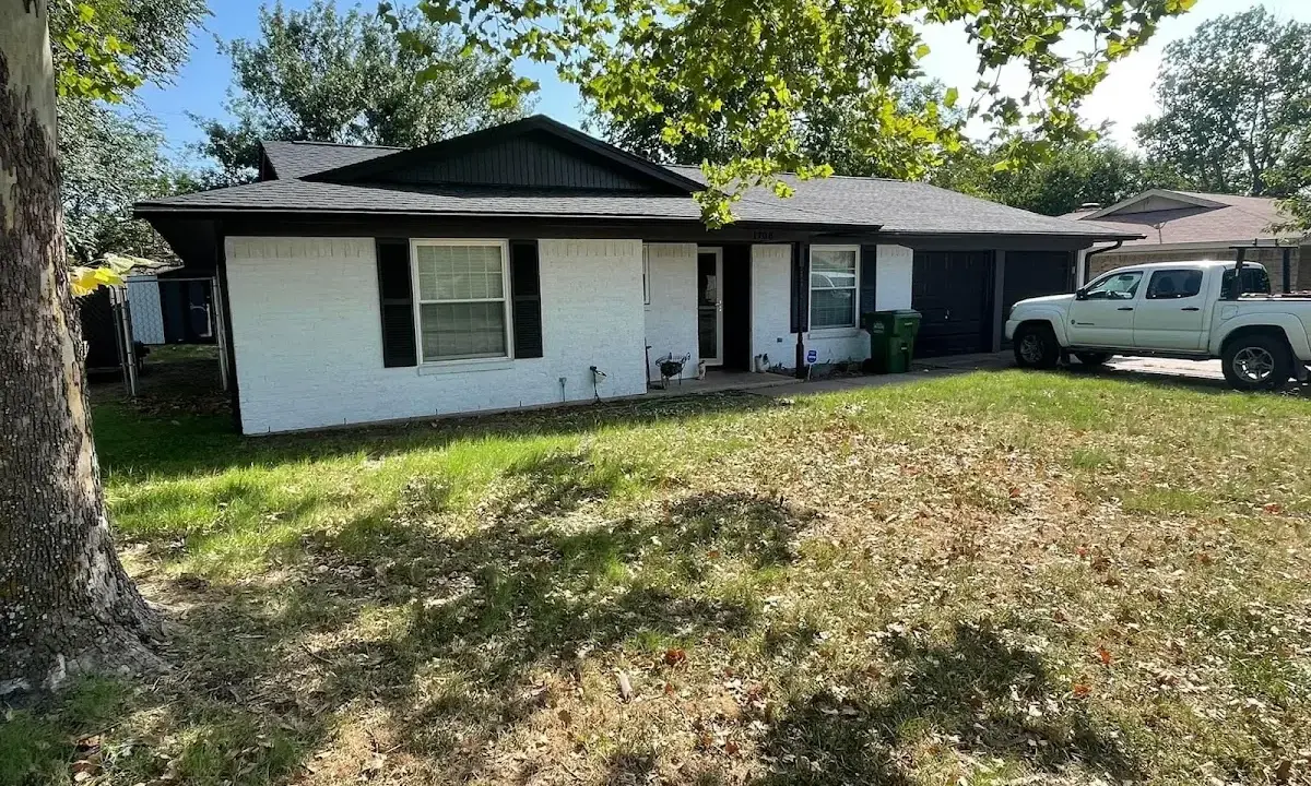 Professional roofing crew working on a residential roof in Loganville